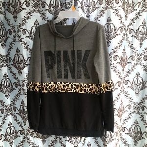 Pull-over hoodie in gray, black and Leopard print and “PINK” text. size small.
